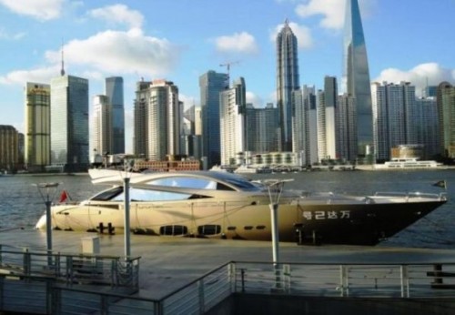 A Luxury Yacht Sitting On The Huangpu River